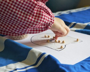 Fine motor skills using tweezers via Lessons Learnt Journal