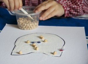 Fine motor skills using tweezers via Lessons Learnt Journal