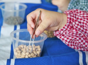 Fine motor skills using tweezers via Lessons Learnt Journal